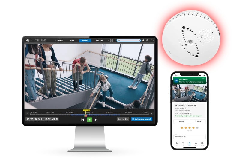 Monitor showing stairwell surveillance footage, sensor device, and smartphone alert screen