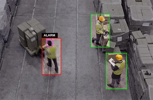 Ai detects warehouse workers with safety alert.