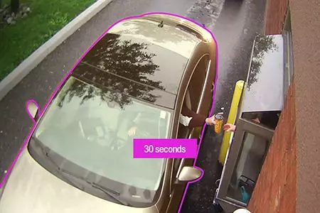 Drive-thru car receiving order with 30-second timer