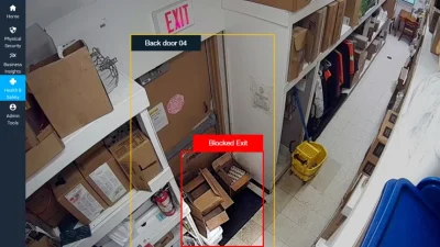 Blocked exit detected at back door in storage area