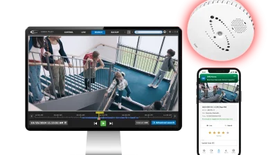 Monitor showing stairwell surveillance footage, sensor device, and smartphone alert screen