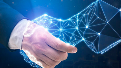 Handshake with digital network overlay symbolizing technology integration